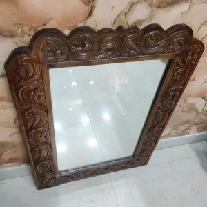 wooden art piece featuring a mirror