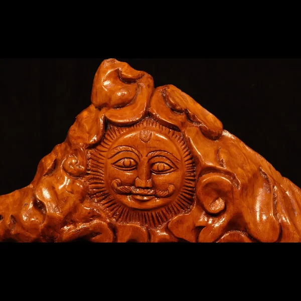 wooden artwork of the sun